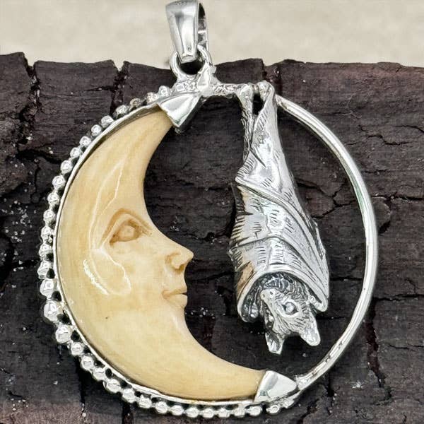 Bat In Carved Bone Moon Pendant