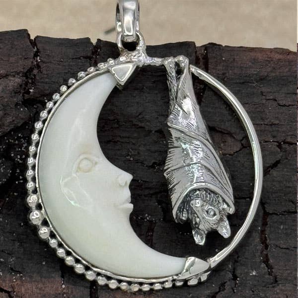 Bat In Carved Bone Moon Pendant