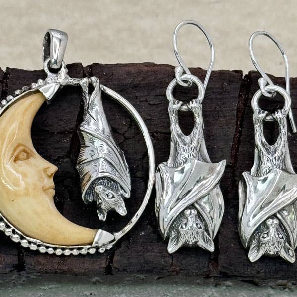 Bat In Carved Bone Moon Pendant