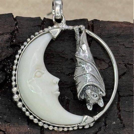 Bat In Carved Bone Moon Pendant